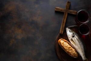 Bread, wine and holy cross as a concept of Jesus feeding multitudes photo