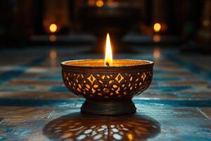Burning candle creating a romantic atmosphere on a wooden table photo