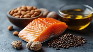 Fresh salmon fillet seasoned with salt and peppercorns on a cutting board photo