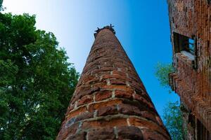 Old, brick column, bottom-up view photo