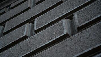 Facing tiles on the wall of the building. Brickwork of the walls photo