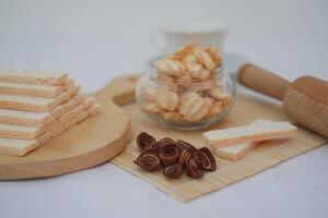 Wafer and Cheese Sago Cookies with elephant ear cookies. Eid al-Fitr snacks photo