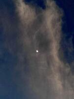 Moon in dark sky photo