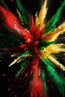 Abstract explosion of red, green, and gold powder on black background. photo