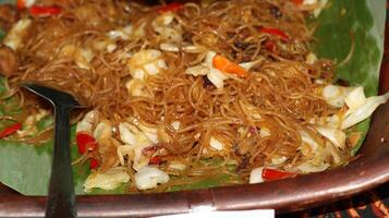 Bihun goreng rice vermicelli with vegetables and chili photo