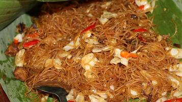Bihun goreng rice vermicelli with vegetables and chili photo
