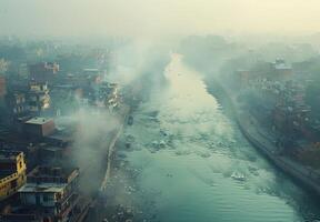 A polluted river flowing through a city with smog hovering above photo