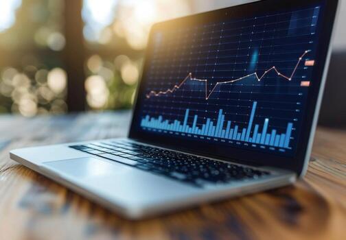 A digital growth chart displayed on a laptop screen, indicating financial success photo