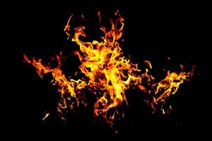 Fire flame texture. Burning material backdrop. Burn effect pattern. Blaze and torch wallpaper. Heat and haze backdrop. photo