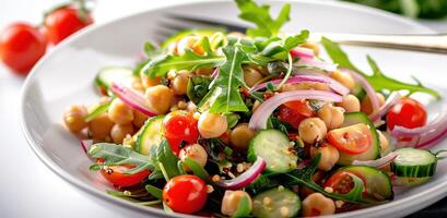 Vegetarian chickpea salad prepared with tomatoes, cucumber, red onion, cress salad and arugula, White Background, photo