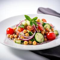 Vegetarian chickpea salad prepared with tomatoes, cucumber, red onion, cress salad and arugula, White Background, photo