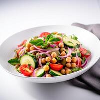 Vegetarian chickpea salad prepared with tomatoes, cucumber, red onion, cress salad and arugula, White Background, photo