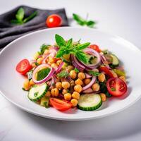 Vegetarian chickpea salad prepared with tomatoes, cucumber, red onion, cress salad and arugula, White Background, photo