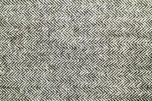 Natural Linen Material Textile Canvas Fabric Texture Background Close-up Detail of Fabric Natural Color Hemp Material Pattern Design Wallpaper. Can be Used as Background or For Graphic Design photo