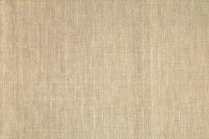 Natural Linen Material Textile Canvas Fabric Texture Background Close-up Detail of Fabric Natural Color Hemp Material Pattern Design Wallpaper. Can be Used as Background or For Graphic Design photo