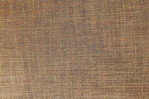 Natural Linen Material Textile Canvas Fabric Texture Background Close-up Detail of Fabric Natural Color Hemp Material Pattern Design Wallpaper. Can be Used as Background or For Graphic Design photo