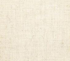 Natural Linen Material Textile Canvas Fabric Texture Background Close-up Detail of Fabric Natural Color Hemp Material Pattern Design Wallpaper. Can be Used as Background or For Graphic Design photo