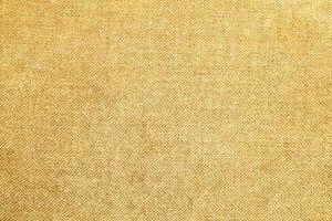 Natural Linen Material Textile Canvas Fabric Texture Background Close-up Detail of Fabric Natural Color Hemp Material Pattern Design Wallpaper. Can be Used as Background or For Graphic Design photo