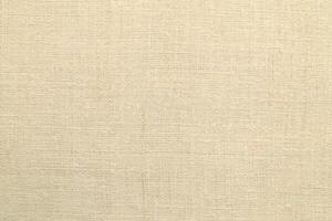 Natural Linen Material Textile Canvas Fabric Texture Background Close-up Detail of Fabric Natural Color Hemp Material Pattern Design Wallpaper. Can be Used as Background or For Graphic Design photo