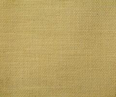 Natural Linen Material Textile Canvas Fabric Texture Background Close-up Detail of Fabric Natural Color Hemp Material Pattern Design Wallpaper. Can be Used as Background or For Graphic Design photo
