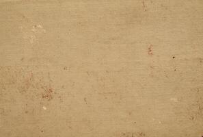 An old, dirty paper with some stains on it photo
