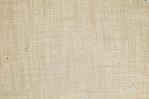Natural linen material textile canvas Fabric texture background Close-up detail of fabric natural color Hemp material pattern design wallpaper. can be used as background or for graphic design photo