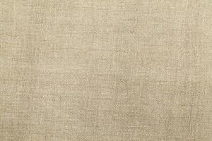 Natural linen material textile canvas Fabric texture background Close-up detail of fabric natural color Hemp material pattern design wallpaper. can be used as background or for graphic design photo