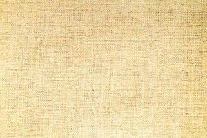 Natural linen material textile canvas Fabric texture background Close-up detail of fabric natural color Hemp material pattern design wallpaper. can be used as background or for graphic design photo