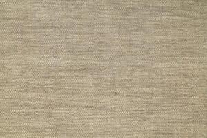 Natural linen material textile canvas Fabric texture background Close-up detail of fabric natural color Hemp material pattern design wallpaper. can be used as background or for graphic design photo