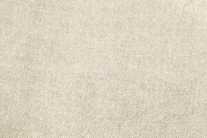 Natural linen material textile canvas Fabric texture background Close-up detail of fabric natural color Hemp material pattern design wallpaper. can be used as background or for graphic design photo