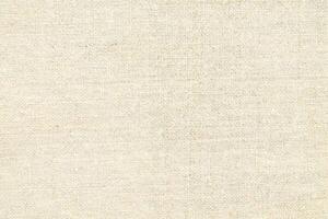 Natural linen material textile canvas Fabric texture background Close-up detail of fabric natural color Hemp material pattern design wallpaper. can be used as background or for graphic design photo