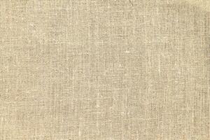 Natural linen material textile canvas Fabric texture background Close-up detail of fabric natural color Hemp material pattern design wallpaper. can be used as background or for graphic design photo
