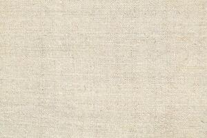 Natural linen material textile canvas Fabric texture background Close-up detail of fabric natural color Hemp material pattern design wallpaper. can be used as background or for graphic design photo
