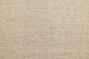 Natural linen material textile canvas Fabric texture background Close-up detail of fabric natural color Hemp material pattern design wallpaper. can be used as background or for graphic design photo