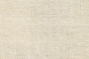 Natural linen material textile canvas Fabric texture background Close-up detail of fabric natural color Hemp material pattern design wallpaper. can be used as background or for graphic design photo