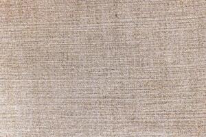 Natural linen material textile canvas Fabric texture background Close-up detail of fabric natural color Hemp material pattern design wallpaper. can be used as background or for graphic design photo