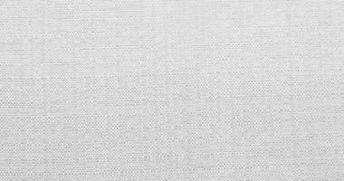 Natural linen material textile canvas Fabric texture background Close-up detail of fabric natural color Hemp material pattern design wallpaper. can be used as background or for graphic design photo
