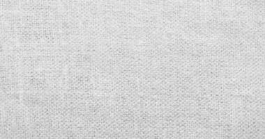 Natural linen material textile canvas Fabric texture background Close-up detail of fabric natural color Hemp material pattern design wallpaper. can be used as background or for graphic design photo