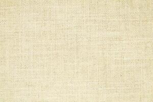 Natural linen material textile canvas Fabric texture background Close-up detail of fabric natural color Hemp material pattern design wallpaper. can be used as background or for graphic design photo
