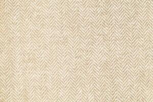 Natural linen material textile canvas Fabric texture background Close-up detail of fabric natural color Hemp material pattern design wallpaper. can be used as background or for graphic design photo