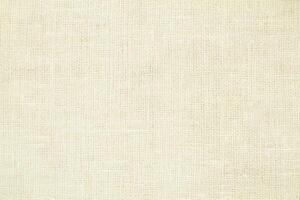 Natural linen material textile canvas Fabric texture background Close-up detail of fabric natural color Hemp material pattern design wallpaper. can be used as background or for graphic design photo
