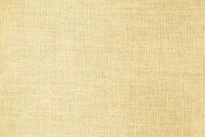 Natural linen material textile canvas Fabric texture background Close-up detail of fabric natural color Hemp material pattern design wallpaper. can be used as background or for graphic design photo