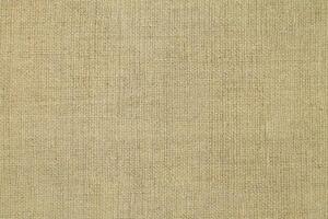 Natural linen material textile canvas Fabric texture background Close-up detail of fabric natural color Hemp material pattern design wallpaper. can be used as background or for graphic design photo