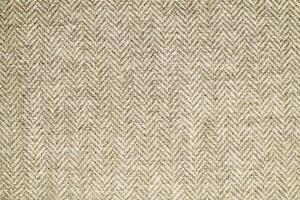 Natural linen material textile canvas Fabric texture background Close-up detail of fabric natural color Hemp material pattern design wallpaper. can be used as background or for graphic design photo