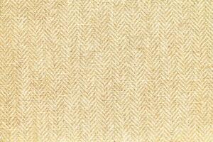 Natural linen material textile canvas Fabric texture background Close-up detail of fabric natural color Hemp material pattern design wallpaper. can be used as background or for graphic design photo