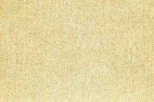 Natural linen material textile canvas Fabric texture background Close-up detail of fabric natural color Hemp material pattern design wallpaper. can be used as background or for graphic design photo