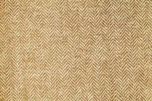 Natural linen material textile canvas Fabric texture background Close-up detail of fabric natural color Hemp material pattern design wallpaper. can be used as background or for graphic design photo