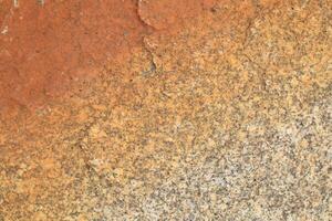 Abstract natural rock stone granite grunge rusty metal texture design background natural color stone material granite design wallpaper. Close-up detail of natural stone photo