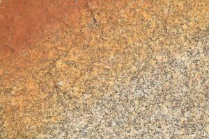 Abstract natural rock stone granite grunge rusty metal texture design background natural color stone material granite design wallpaper. Close-up detail of natural stone photo