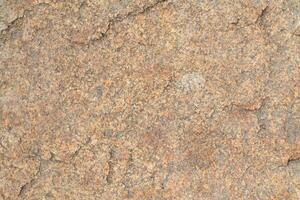 Abstract natural rock stone granite grunge rusty metal texture design background natural color stone material granite design wallpaper. Close-up detail of natural stone photo